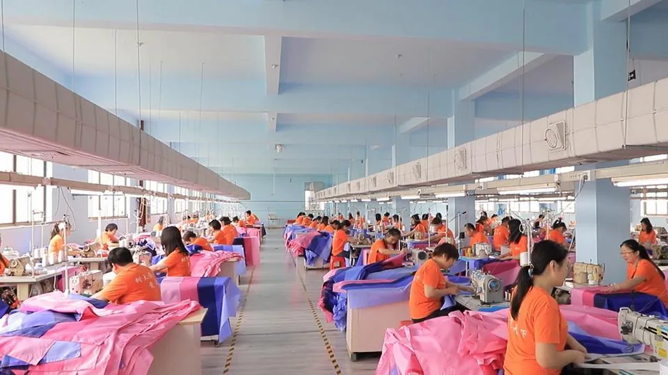 Sewing workshop where Wolflag workers stitch custom flags and banners