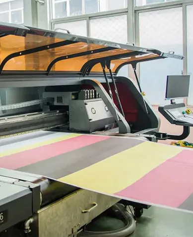 Flag printing machine at Wolflag flag factory